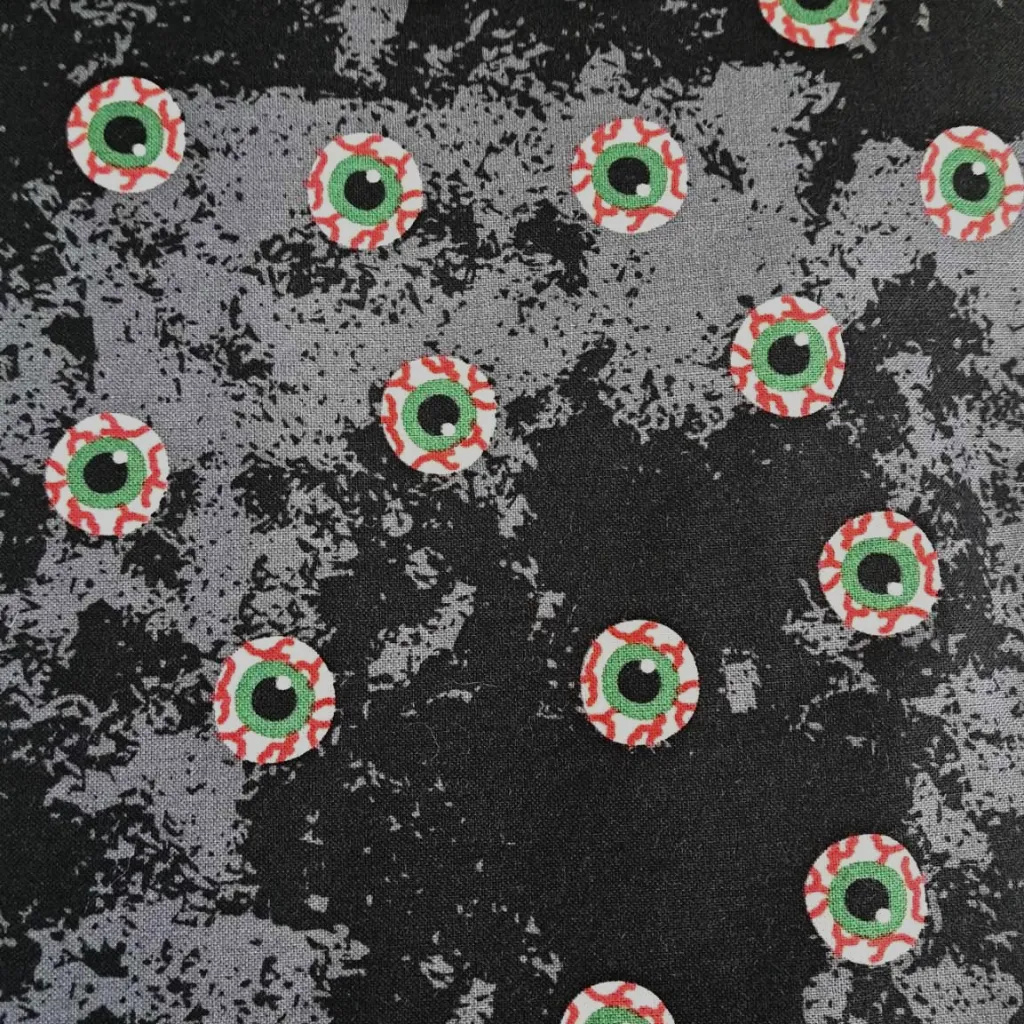 Black Blood Shot Eyes Fabric - Actual Image.webp